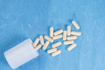 medical pills on a blue background