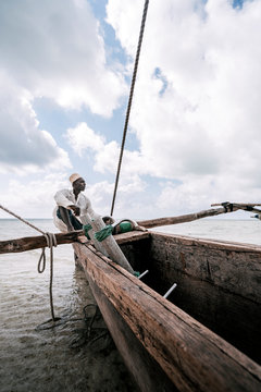 Fisherman in Zanzibar. A fisherman in Zanzibar on a quiet sunny