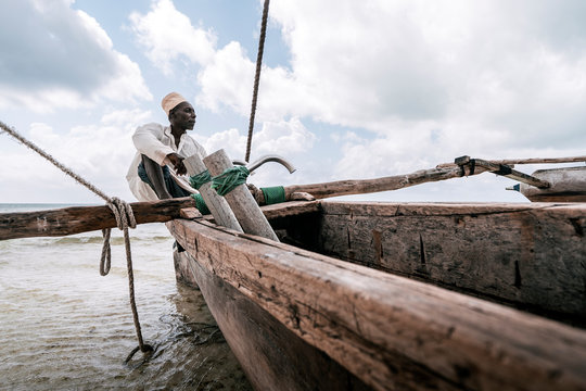 Fisherman in Zanzibar. A fisherman in Zanzibar on a quiet sunny
