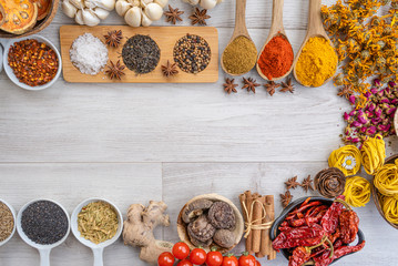 Colourful various herbs and spices for cooking on  background