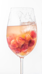 glass of white wine and bunch of grapes