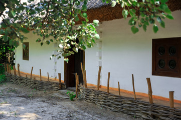 Ukrainian hut. Elements of decoration of a country house. Ukrainian traditions