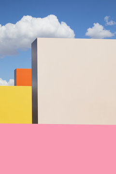 Watercolor buildings against blue sky