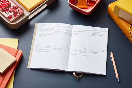 Composition of personal planner with office supplies