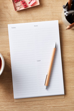 Empty page of notepad on desk