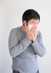 man wearing mask get sick from corona virus, covid19 symptom as sneezing, cough, fever, body ache, breathing , pain.