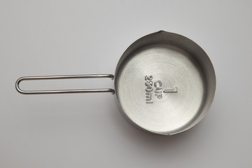 Empty Inox Measuring cup. 125 ml.