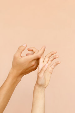 Crop hands touching fingers