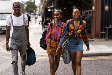 Group of friends walking on the strees of London