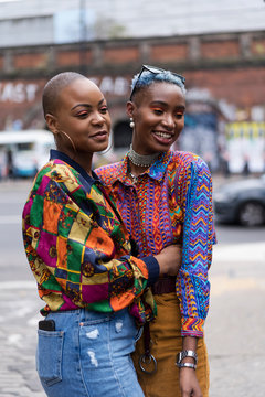 Two afro women having fun in the city