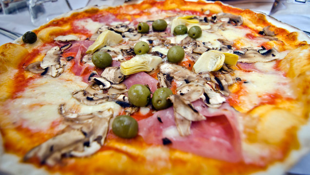 Close-up of Pizza Quattro Stagioni (Four Seasons).