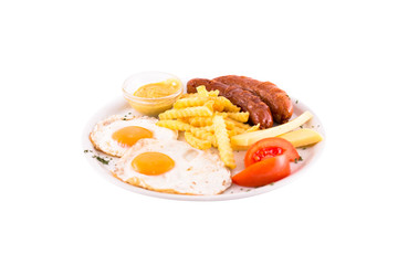 Grilled sausages with two eggs, tomatoes and french fries. Photo taken on a white background. Dish of Montenegrin cuisine. Suitable for the restaurant menu.