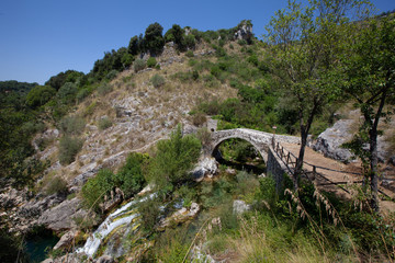 source of the Auso river and the ancient Roman bridge and the old water mill in Cilento and Vallo...