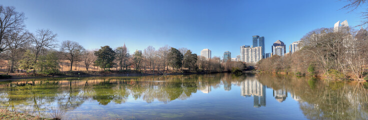 Fototapeta na wymiar Panorama of Atlanta, Georgia skyline with reflections