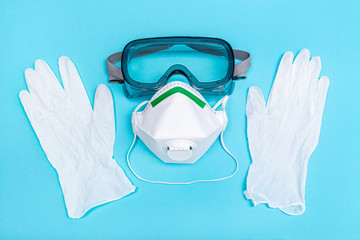 Safety equipment or Protective suit to fight to Coronavirus COVID-19 virus outbreak. Safety mask, protective gloves and glasses