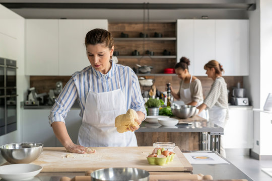 Kitchen class lesson with people cooking food