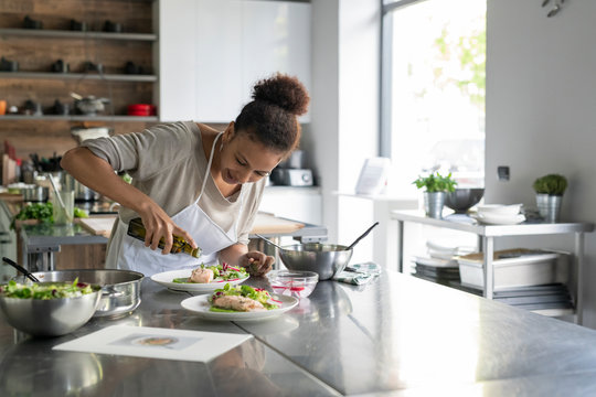 Woman cooking during a kitchen class