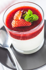 Italian dessert panna cotta with strawberries