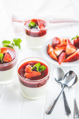 Italian dessert panna cotta with strawberries