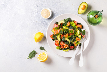Salmon Salad with Vitamins in vegetables, herbs and avocado