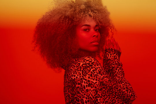 Amazing woman portrait behind red filter