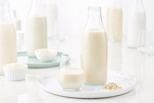 Tray with oat milk in bottle and glass