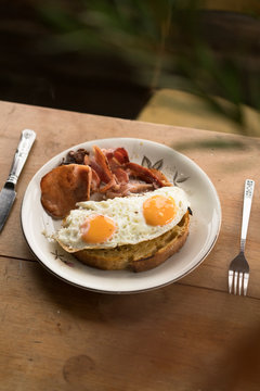Simple bacon and eggs in a rustic cabin