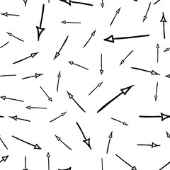 Hand drawn straight arrows randomly placed on white background. Seamless pattern. Right, left, up and down abstract pointers with arrowheads wrapping texture. Vector eps8 illustration.