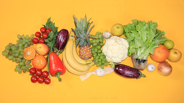 Vegetables, Fruits On A Bright Background. The Concept Of Healthy And Natural Foods For Boosting Immunity, A Healthy Lifestyle And Weight Loss, Vitamins. Summer Banner For The Screen, Place For Text,