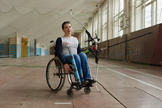 Active Disabled Woman With Bow And Arrows