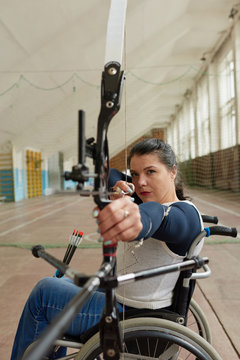 Confident Disabled Woman Shooting Bow