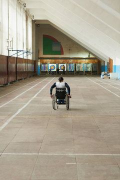 Woman On Wheelchair Going Away