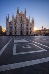 Early morning lights on the Piazza del Duomo in Milan, Italy.