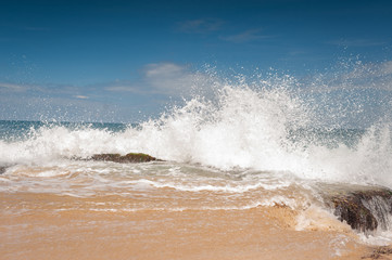 Beach and beautiful views of the cliffs, splashing waves and nature.