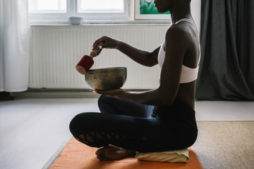Profile of Black Woman Performing Sound Healing