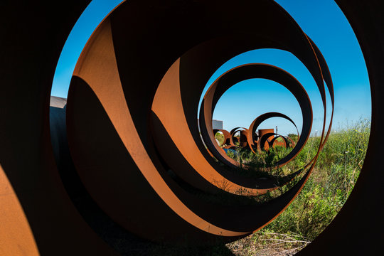 Geometrical abstract shapes in rusty corten steel and black shadows