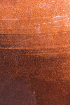 Rusty surface in rusty corten steel and black shadows