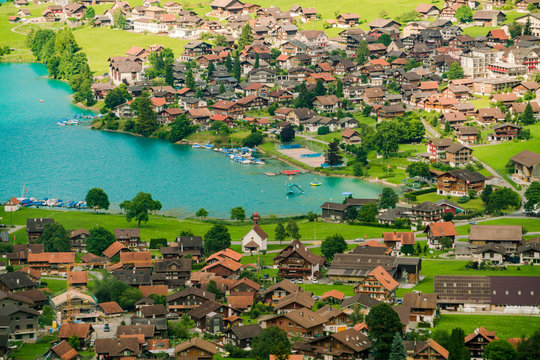 Lungern lake in Obwalden in summer with a village from above