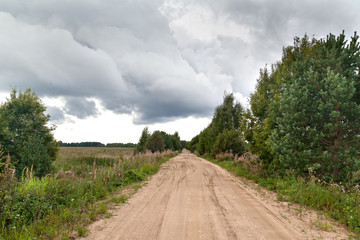 Dirt road in tundra in the north of Russia