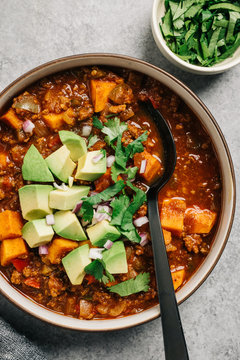 Whole30 paleo chili con carne with sweet potato and fresh avocado