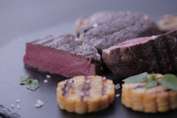 grilled meat grilled vegetables corn