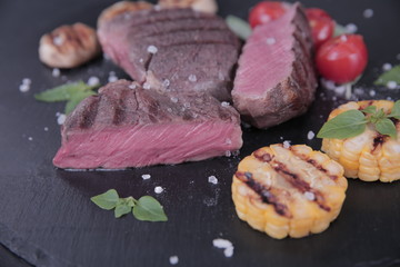grilled meat grilled vegetables corn