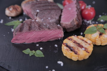 grilled meat grilled vegetables corn