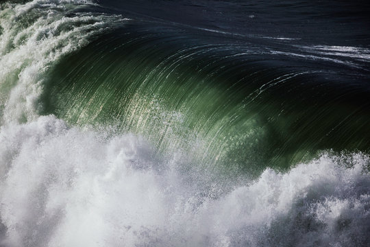 Detailed view of violent sea. Big ocean wave breaking like a waterfall
