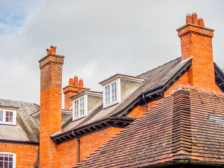 Red roof and chimneys with attic windows. Woodhall Spa. England © RW Jemmett