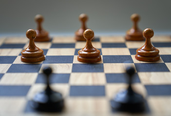 Concept chess pieces express social distancing