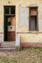 Abandoned old house with faded paint