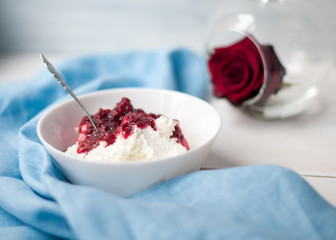 Breakfast cottage cheese with jam berry jam