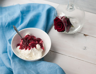 Breakfast cottage cheese with jam berry jam