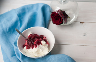 Breakfast cottage cheese with jam berry jam